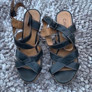 Black strappy wedge sandals